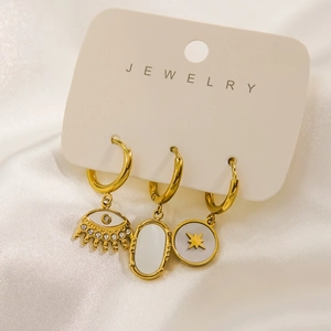 Set di tre orecchini in acciaio inossidabile oro 14K con inserti in conchiglia e stelle