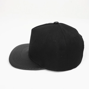 Detailed view of black snapback hat with premium crocodile texture leather flat brim