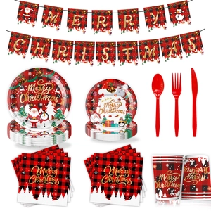 Close-up of red and black buffalo plaid Christmas disposable tableware and festive banners