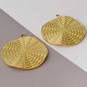 Detailed macro view of 18K gold-plated irregular round pendants with woven metal texture