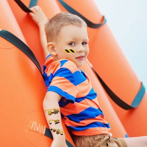 Luminous construction vehicle temporary tattoos for kids featuring yellow crane and excavator