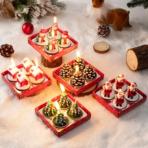 Christmas candle gift set with Santa and snowman figurines for holiday table decor