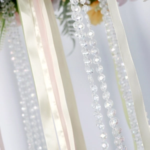 Floral hanging decorations with crystal beads and satin ribbons for party events