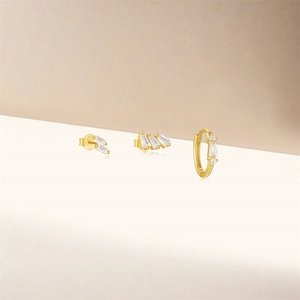 Detailed macro view of S925 sterling silver stamp on golden zircon earring set