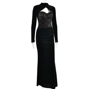 Close-up of black lace patchwork and structured corset bodice on long sleeve dress