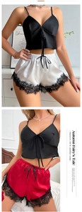 Two-piece satin sleepwear set featuring camisole top and lace trim shorts in red and white