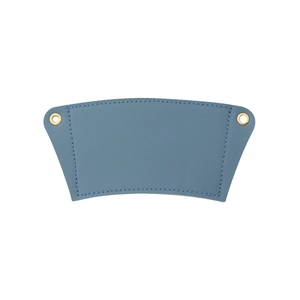 Detailed flat lay of blue PU leather coffee sleeve with gold eyelets and stitching