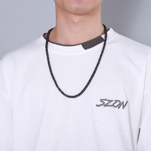 Retro black stainless steel box chain necklace for men shown on a model neck