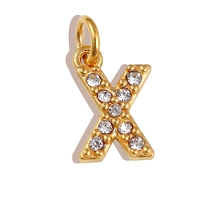 Close-up of gold letter X pendant with sparkling rhinestones for DIY jewelry making