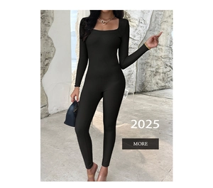 Detail view of black ribbed long sleeve jumpsuit with square neckline on model