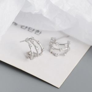 Three-layer silver bamboo hoop earrings with clear crystal stones in luxury design