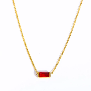 Golden stainless steel necklace featuring a rectangle red zircon birthstone pendant