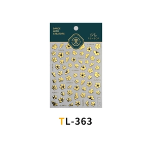 Detailed close-up of TL-363 gold floral embossed nail stickers with premium packaging