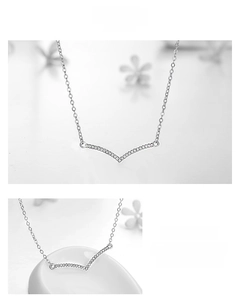 Detail of V-shaped S925 sterling silver necklace with micro-pave white cubic zirconia