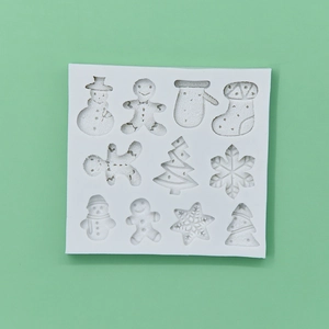 Christmas silicone mold with snowman and tree shapes for DIY baking and chocolate