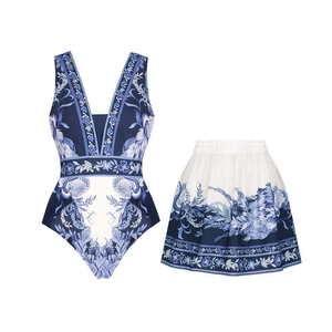 Blue and white porcelain print swimsuit set with V-neck one-piece and A-line skirt