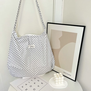 Minimalist white polka dot canvas tote bag with black dots for women's daily commute