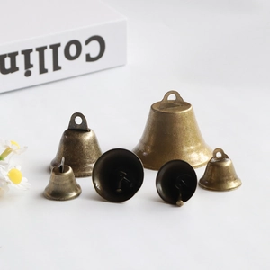 Set of 6 vintage bronze bell charms for DIY crafts and rustic Christmas decorations