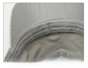 Detail of widened sweatband and precision stitching inside the grey sun hat
