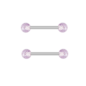 Vue détaillée des boules en acrylique rose pailleté sur un piercing barbell en acier