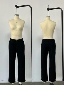 Front and back view of straight-cut black washed denim jeans on mannequins