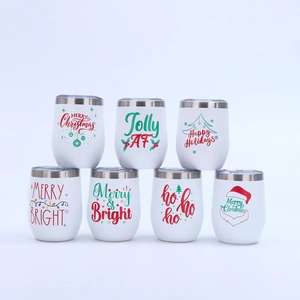 Set of seven white Christmas themed 12oz stainless steel egg mugs with holiday prints