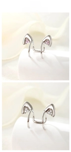 Macro detail of cat ear ear cuffs featuring pink and white pavé cubic zirconia