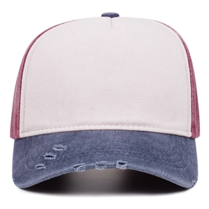 Detailed close-up of retro washed denim baseball cap with distressed brim and contrast colors