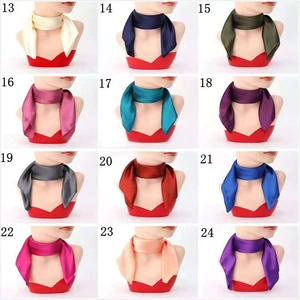 Collage of 12 silk-like satin scarves in various colors for uniform and stage wear