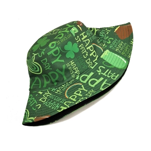 Flat lay of St. Patrick's Day bucket hat with shamrock and rainbow festive patterns