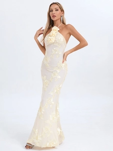Elegant halter neck dress with 3D floral appliques and slim fit fishtail silhouette