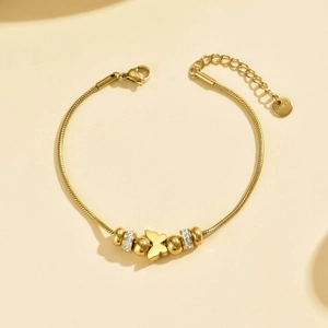 Bracelet chaîne serpent dorée en acier inoxydable avec papillon et perles strass