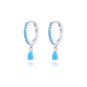 Detailed close-up of S925 sterling silver hoop earrings with sky blue teardrop stones