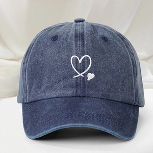 Classic washed denim baseball cap in dark blue with white double heart embroidery detail