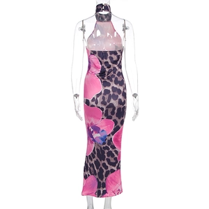 Detail of backless halter dress featuring leopard print and pink orchid pattern