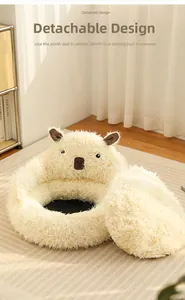 Detail view of detached capybara-shaped pet bed with a removable plush inner cushion
