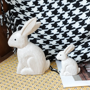 Minimalist off-white rabbit ornaments set with rustic wood-like texture for home decor