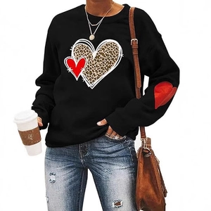 Women's black long sleeve sweatshirt with leopard heart print and red sleeve patches