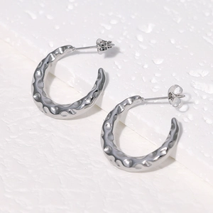 Polished silver C-shaped stainless steel earrings with hammer texture for women