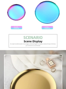 Detail view of round stainless steel jewelry trays in golden and rainbow finish