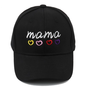 Black cotton baseball cap featuring white mama embroidery and four colorful small hearts