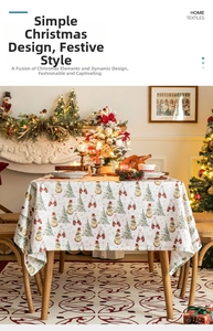 Close-up of a Christmas snowman tablecloth set on a wooden table in a festive home setting