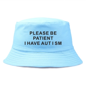Light blue autism awareness bucket hat with Please Be Patient I Have Autism text