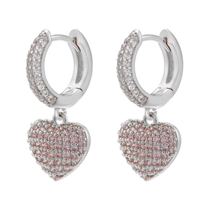 Macro detail of heart hoop earrings with pink and white pavé cubic zirconia