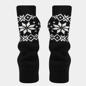 Detailed view of winter knit gloves with white snowflake patterns and thumb hole design