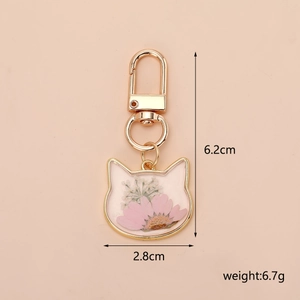 Detailed dimension guide for pink dried flower resin cat keychain with gold metal parts