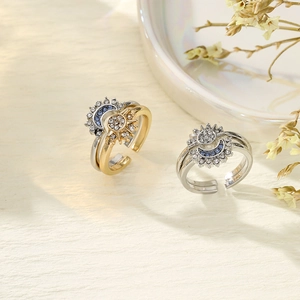Adjustable sun and moon couple rings with inlaid blue crystals in gold and silver finish