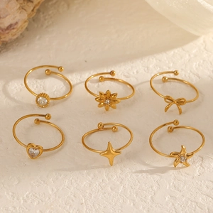 Set of 6 gold adjustable stainless steel rings with zircon heart and star shapes