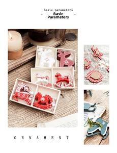 Macro detail of wooden Christmas ornaments including reindeer and skates in a gift box
