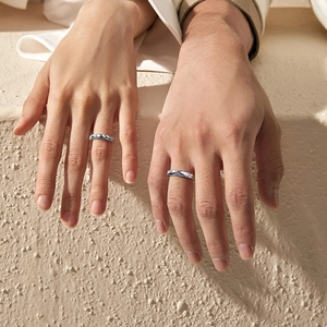 Matching couple rings with blue mountain waves enamel art on polished silver bands